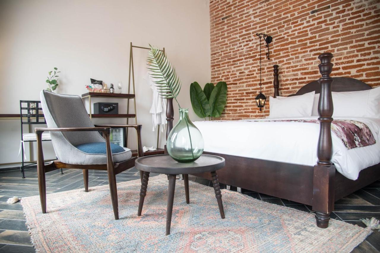 Hotel Soy Local Insignia